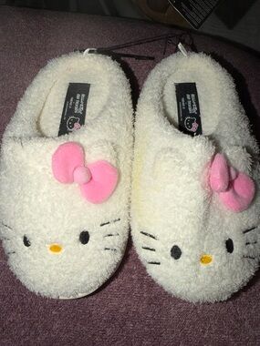 Hello Kitty Cream Plush Slippers with Pink Bows
